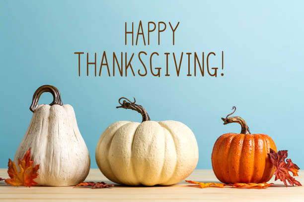 Thanksgiving+message+with+pumpkins+on+a+blue+background