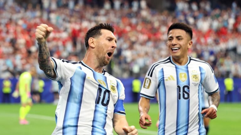 Lionel Messi celebrates after scoring for Argentina in a World Cup match against Austria